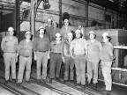 GROUP PHOTO IN THE MILL.